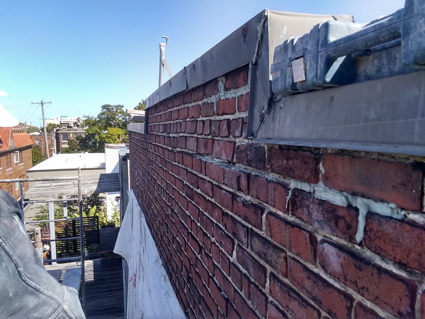 Réparation de ventre de boeuf et mur de brique qui gonfle à Montréal et Laval